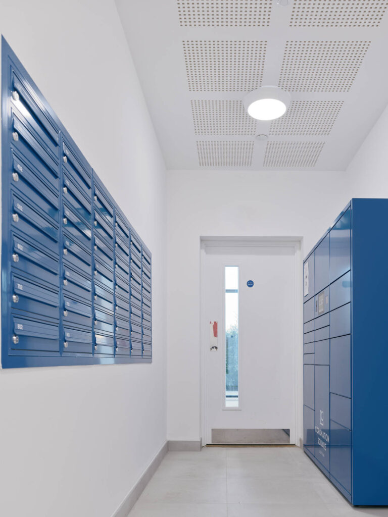 Coronation Square lobby with smart parcel locker and mailboxes